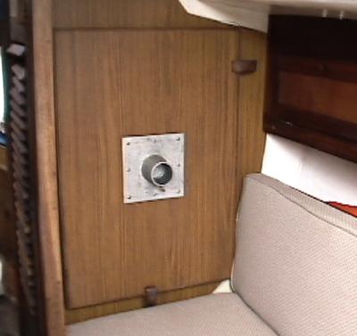 Table stowed by starboard settee (photo courtesy Bill Blevins, Sabrina, #158)